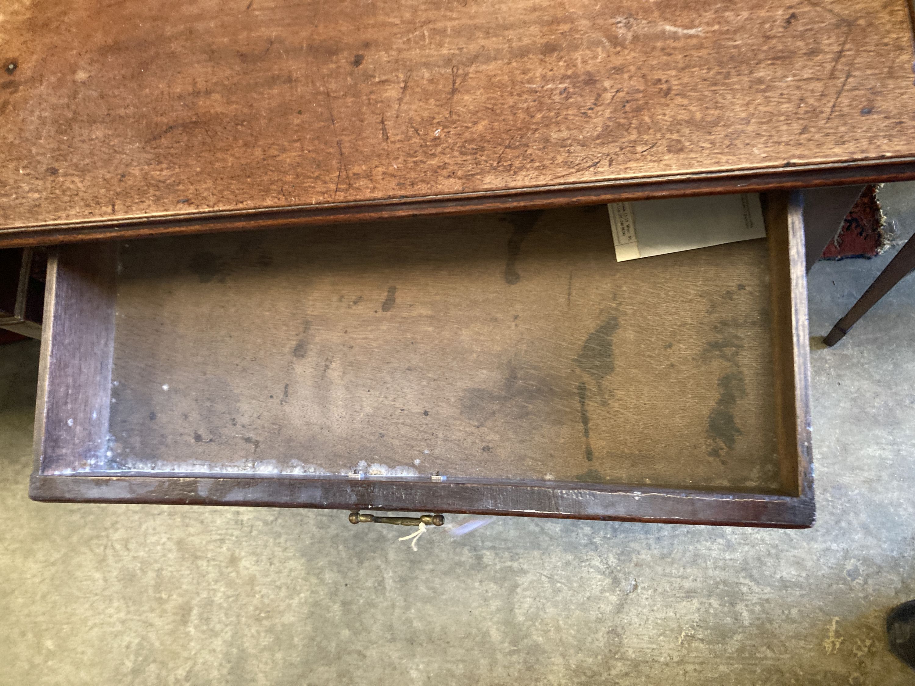 A George II mahogany side table fitted drawer on plain turned legs and pad feet, width 70cm, depth 39cm, height 71cm